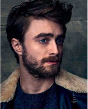 Daniel Radcliffe wearing a Loewe coat and Ermenegildo Zegna sweater for Icon El Pais F:W 2015